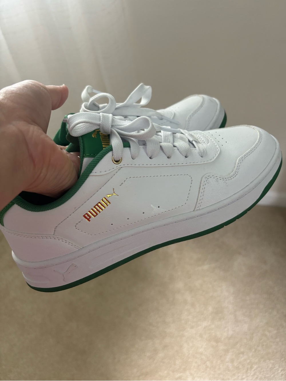 Puma women  White Sneakers with Green Trim and Gold Logo